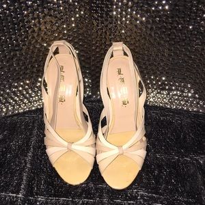 L.A.M.B....nude heels”